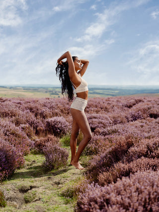 Cream lingerie set- model in cream sustainable lace lingerie set, high rise comfortable knickers and supportive luxury bralette in the moors